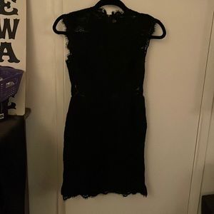 Forever 21 mini lace black dress, new never used,size small fits more like X-S.